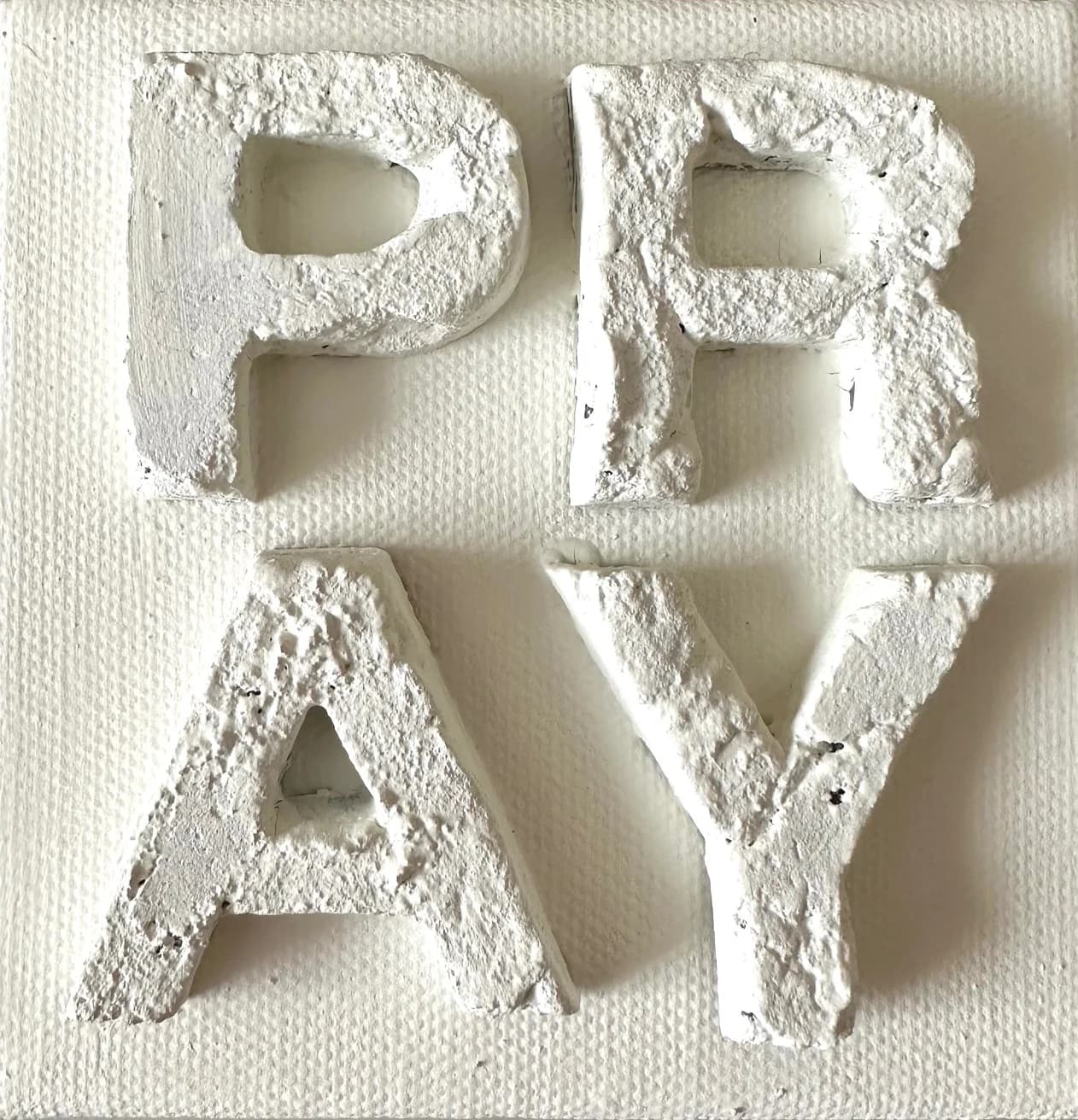 PRAY Sign White on White