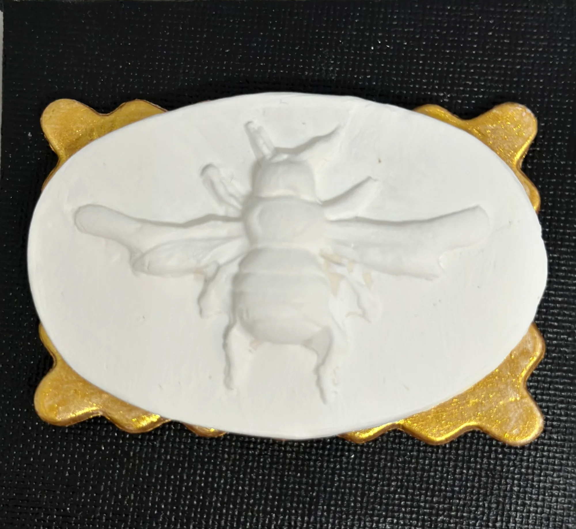White Bee Relief on Gold